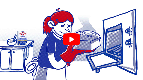 A woman putting a bread into the oven. Click to play video.